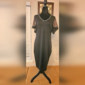A black dinner dress size L.
